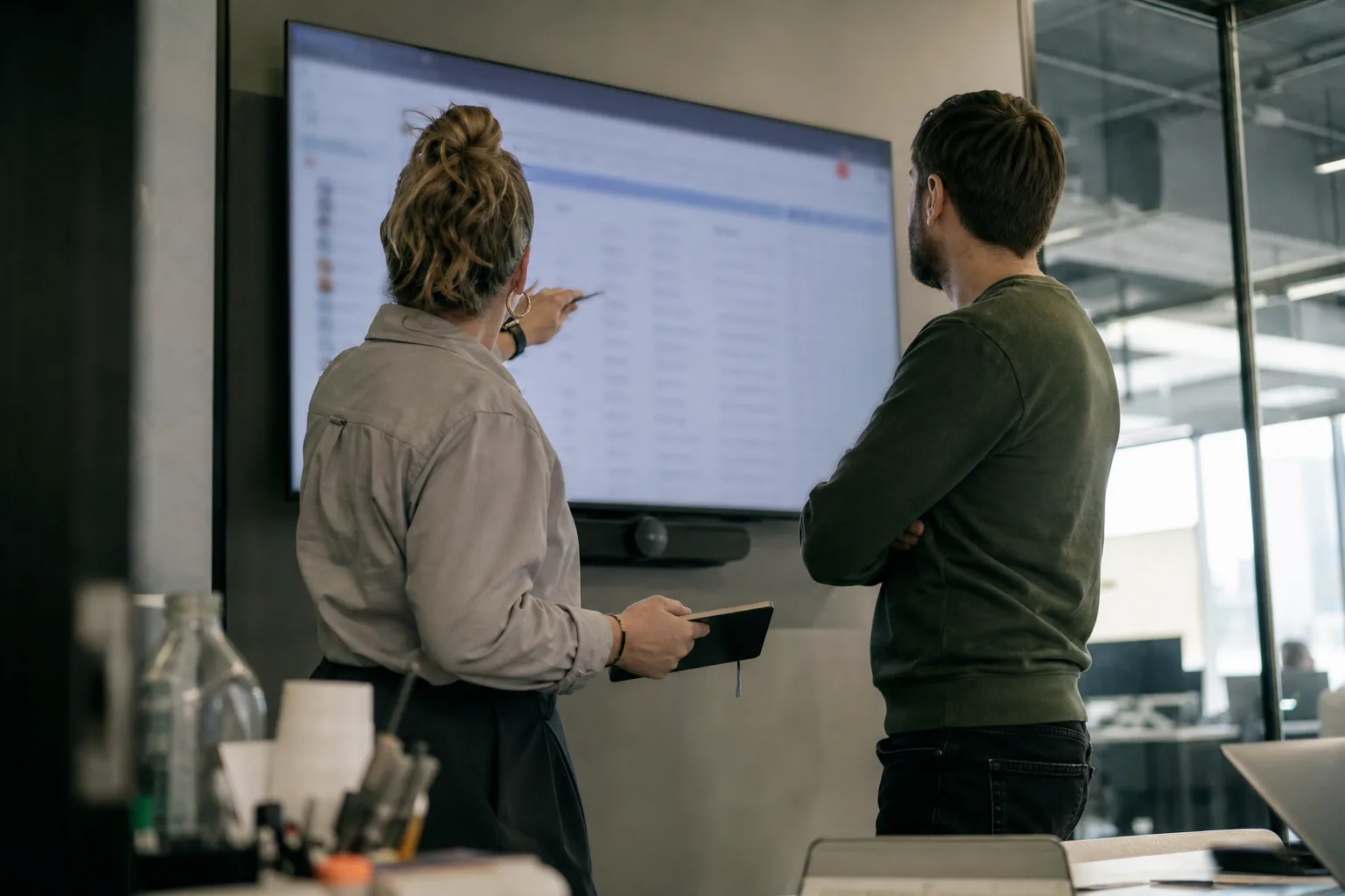 Brand protection team reviewing cases together in a bright office